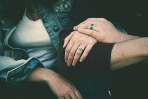 Man and woman's arms