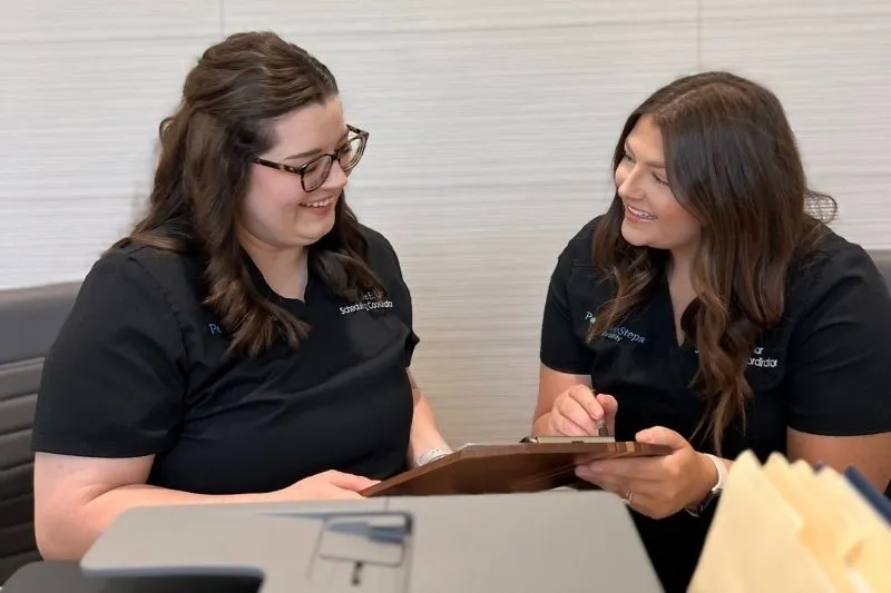 Positive Steps Fertility front desk team welcoming patients for their first fertility appointment