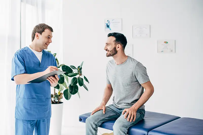 Male patient meeting with a fertility urologist to discuss sperm health, male infertility evaluation, and treatment options at Positive Steps Fertility