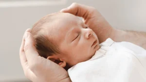 Newborn baby representing family-building through IVF or IUI treatment in Slidell